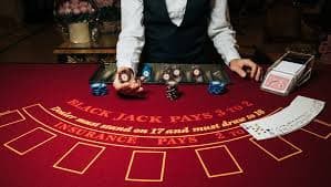 Sic Bo dice cage and roulette wheel setup at Ocean King live studio